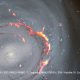 Cosmic Boomerang in Coma Cluster Galaxy